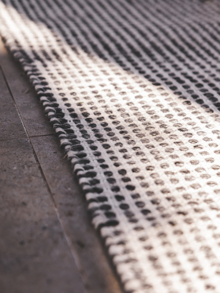 Jardin Outdoor Rug in Coal - outdoor rug- Hertex Haus Online - badge_fully_outdoor