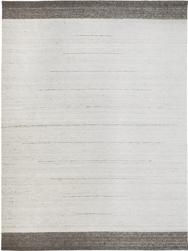 Gray and white striped rug with a two-tone design.