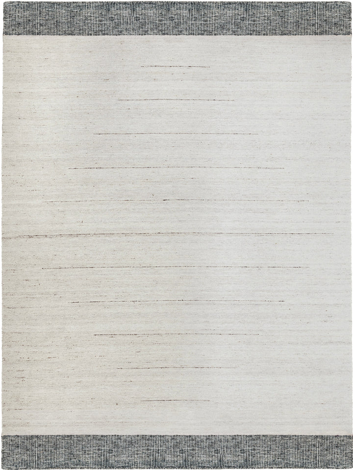 Textured area rug with a two-tone design 