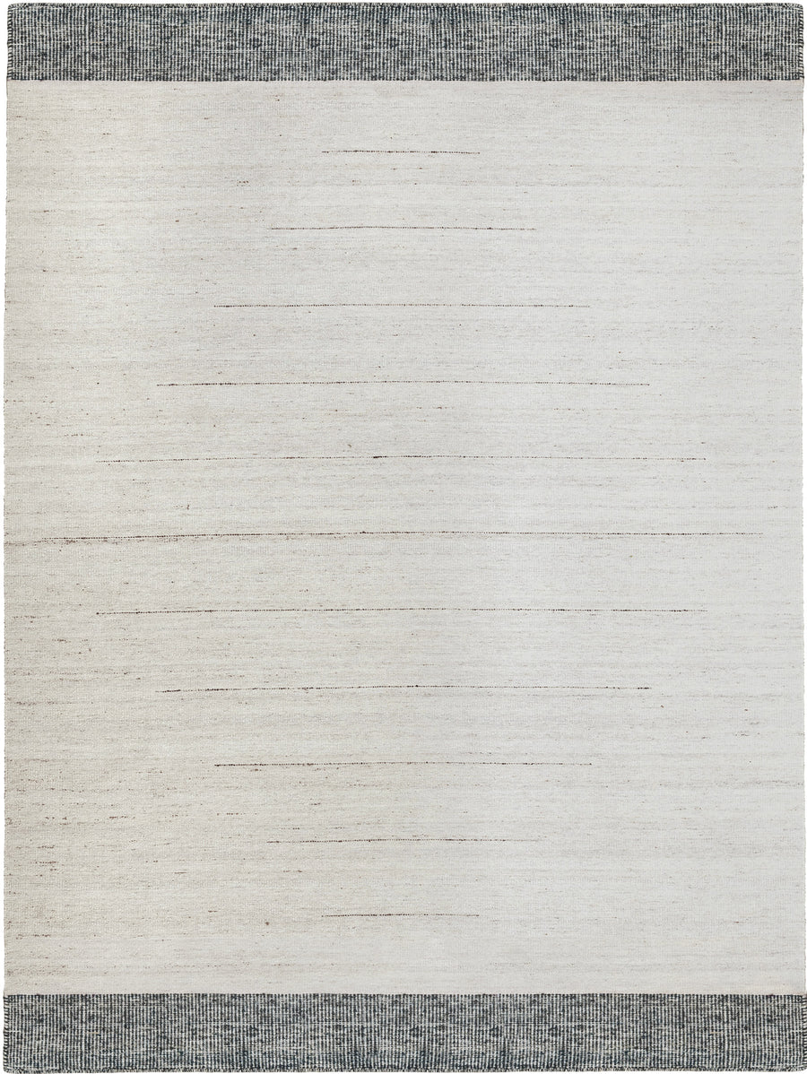 Textured area rug with a two-tone design 
