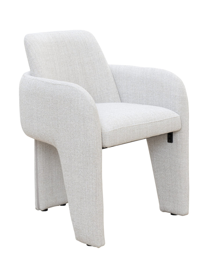 White upholstered dining chair with three legs 