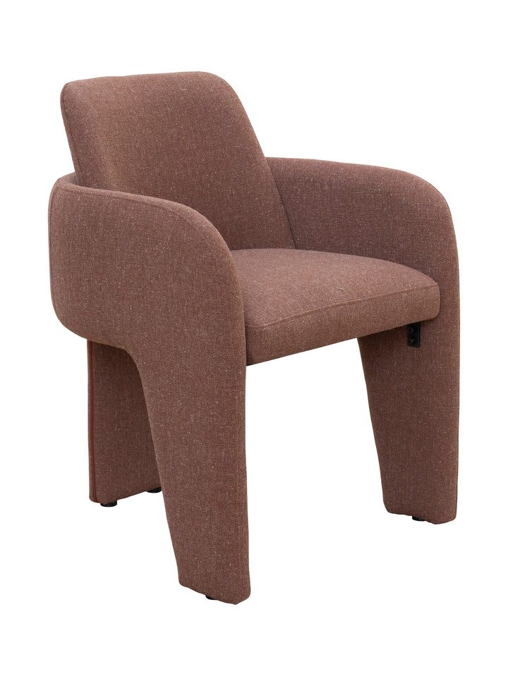 Terracotta red upholstered dining chair with three legs and textured armrests