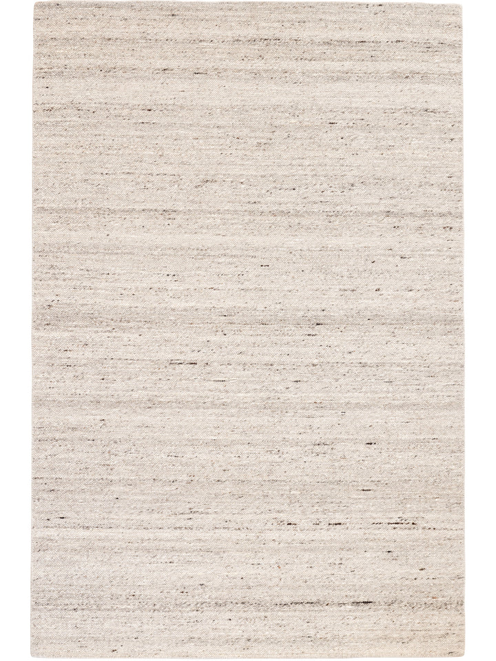 Textured area rug with a neutral color palette 