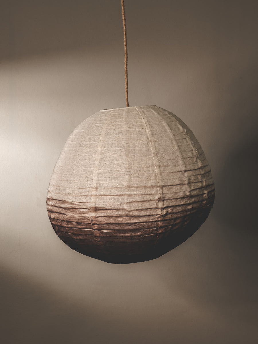 Linen fabric covered lantern pendant in mocha ombre colourway.