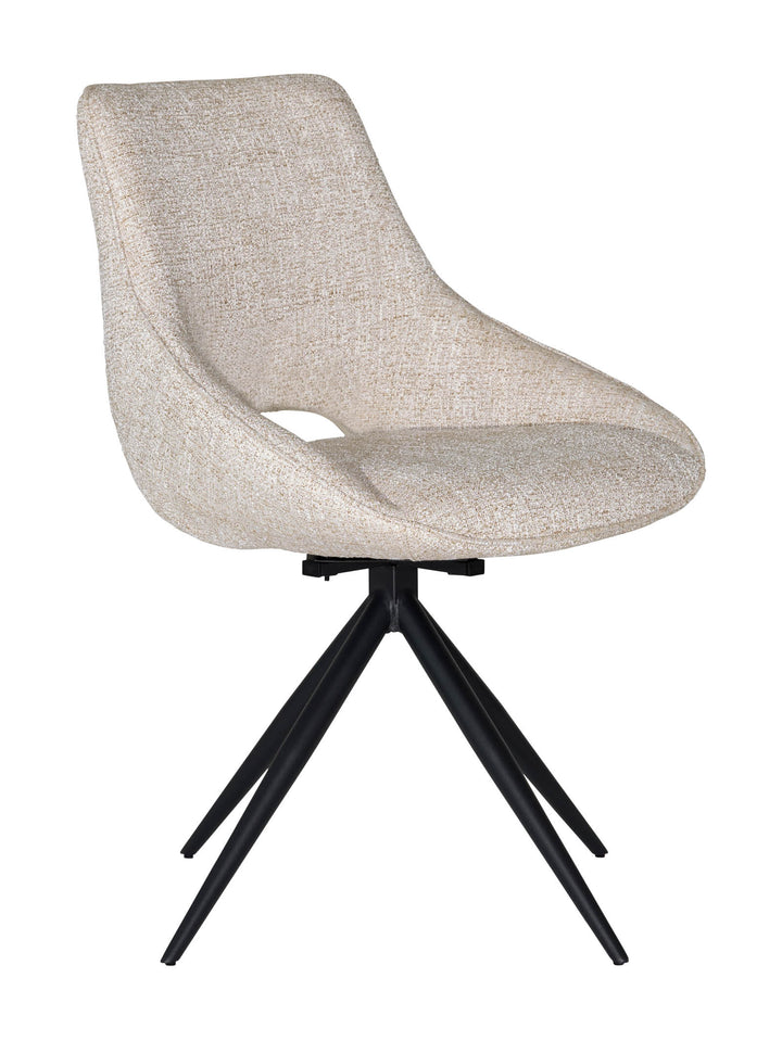 Light beige upholstered swivel dining chair with black metal legs