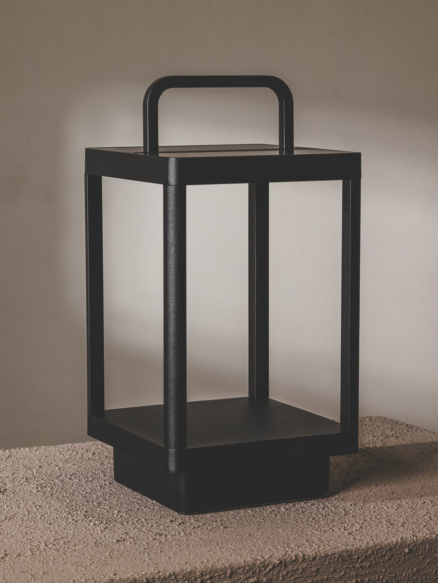 Solar/USB rechargeable outdoor lantern with dimmable feature made of weather-resistant aluminium.