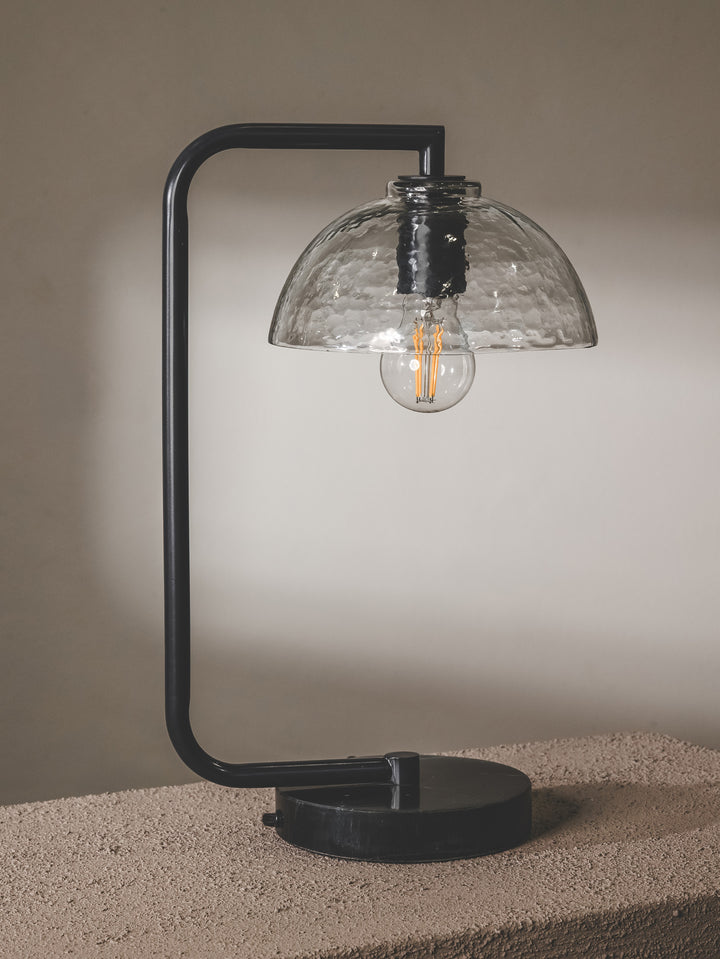 Chic desk lamp with steel frame, glass shade and marble base in black colourway.