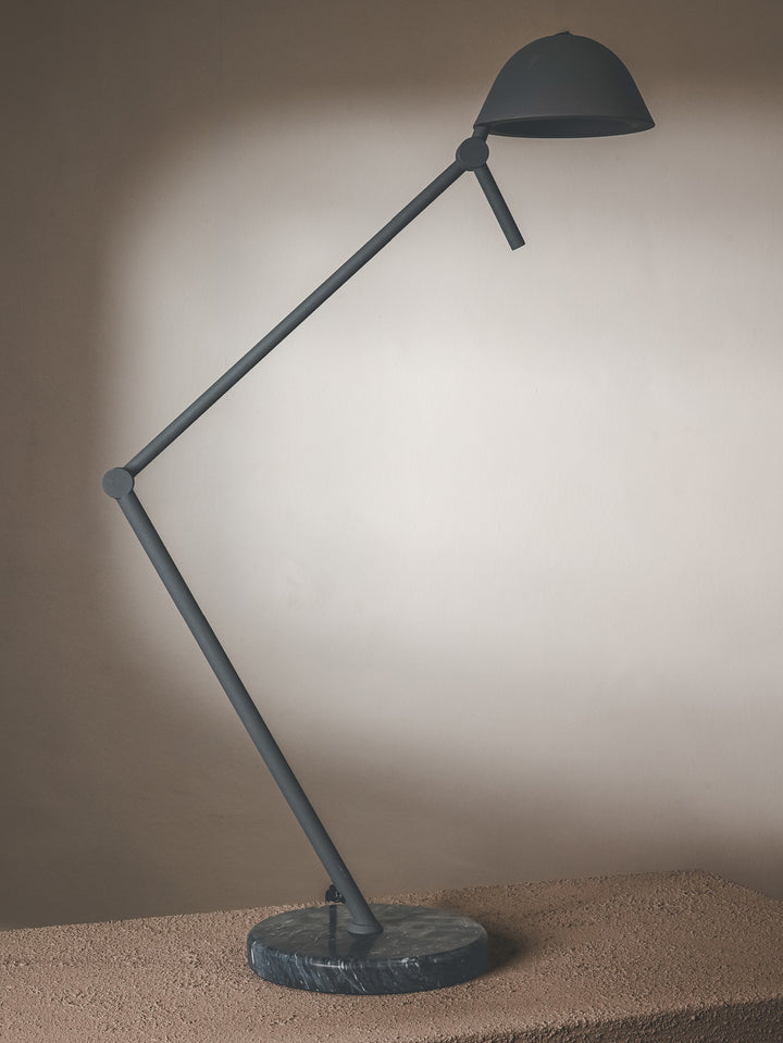 Desk lamp with slim steel frame and marble base featuring an adjustable arm in a grey colourway.