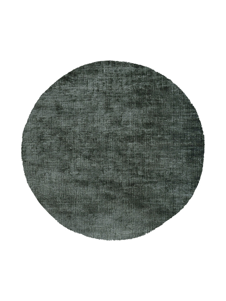 Round rug made of recycled material with a plain minimalist design