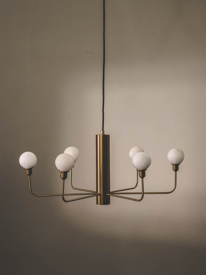 Handmade six-socket chandelier made of alabaster and stainless-steel. 